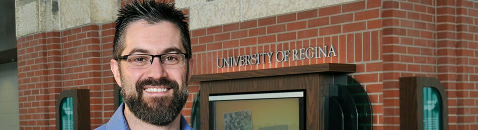 Dr. Paul Bruno standing outside of University of Regina