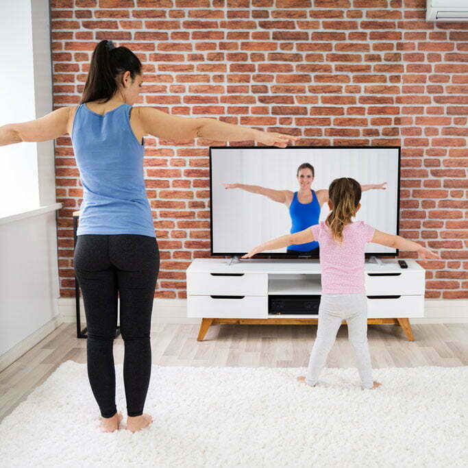Mother and daughter stretching