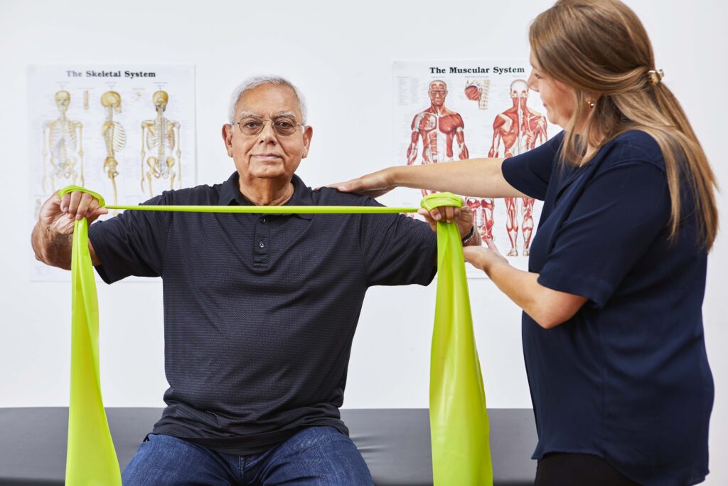 chiropractor with patient